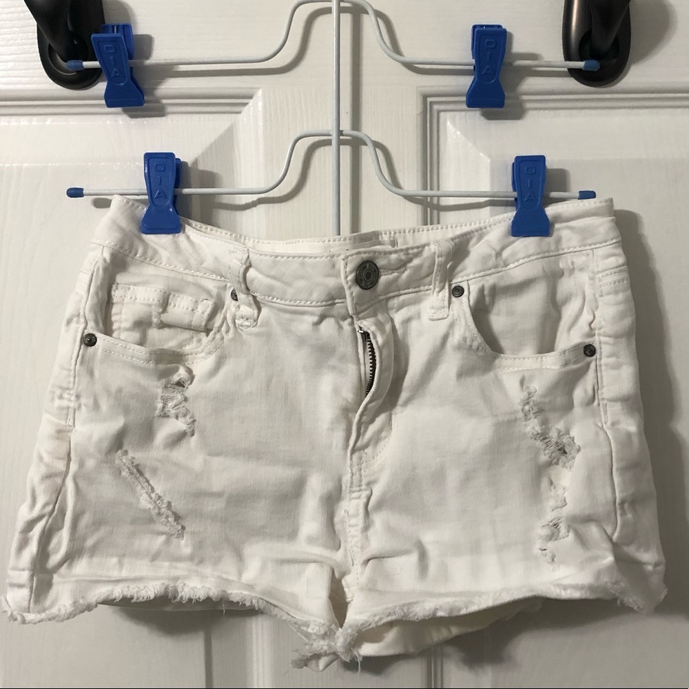 Cute white shorts from Tillys!! Great condition!!